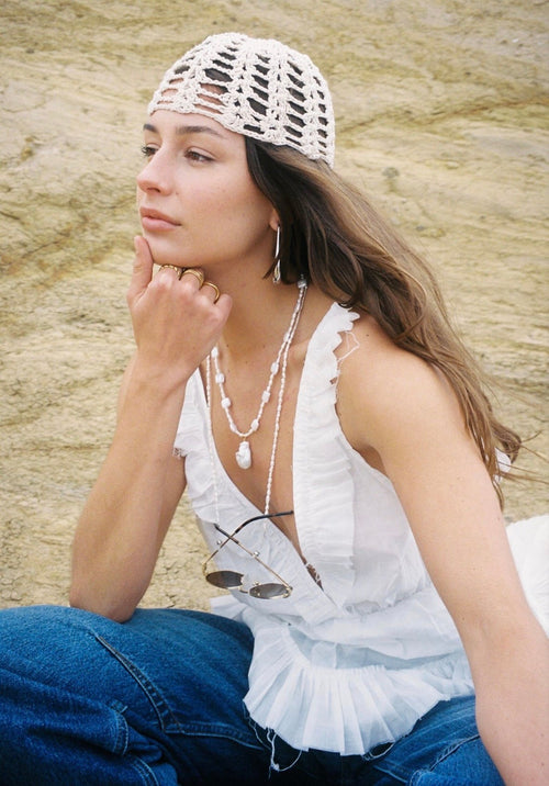 Lottie Earrings close-up, waterproof silver stainless steel earrings by Amali Swim.