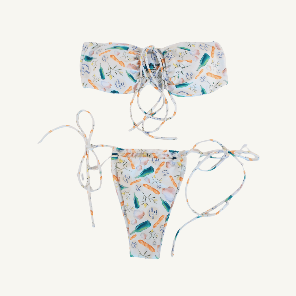 Two-piece bikini set featuring a bandeau-style top and tie-side bottoms with a colorful wine and pasta-themed print on a white background, designed for a stylish and playful summer look. | PicSEO 1778548978564